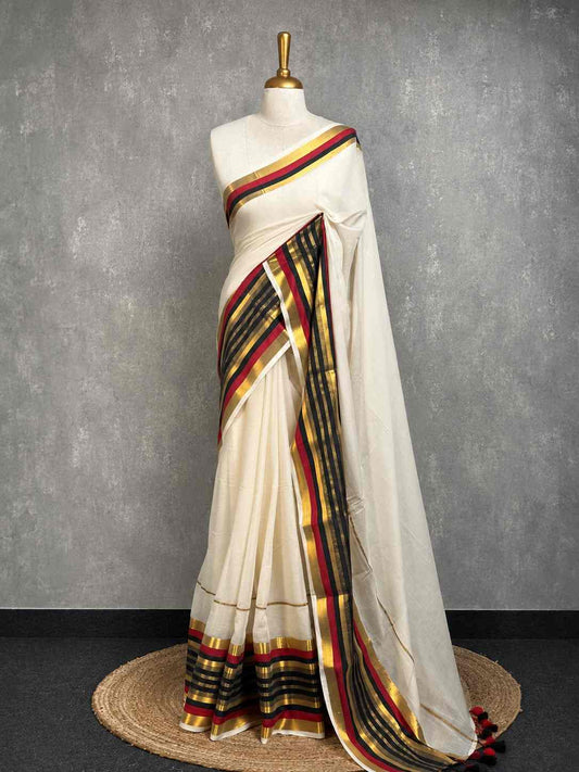 Kerala Kasavu Saree with vibrant red, black, and golden border.