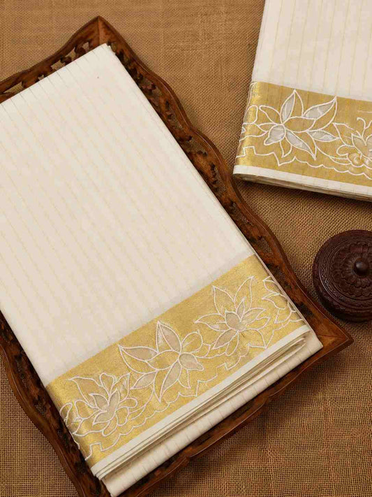 Kerala Kasavu Saree with a beautiful floral golden border